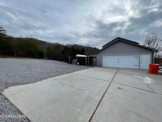 view of home's exterior with a garage