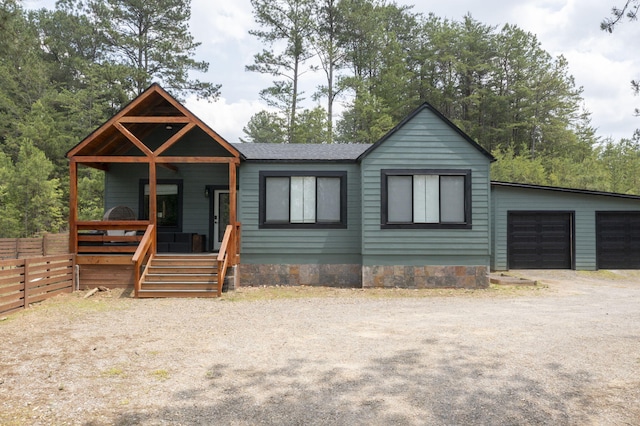 120 Hummingbird Way, Copperhill, TN 37317 - view of front of house with covered porch and a garage