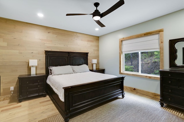 120 Hummingbird Way, Copperhill, TN 37317 - bedroom featuring wooden walls, recessed lighting, ceiling fan, and light wood finished floors