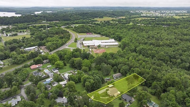 229 Plerce Hill St, Spring City, TN 37381 - aerial view of property and surrounding area with property boundaries highlighted and a heavily wooded area