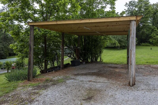 229 Plerce Hill St, Spring City, TN 37381 - view of parking / parking lot featuring a detached carport