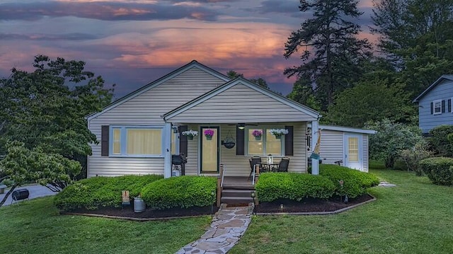 229 Plerce Hill St, Spring City, TN 37381 - bungalow-style home featuring covered porch and a front lawn