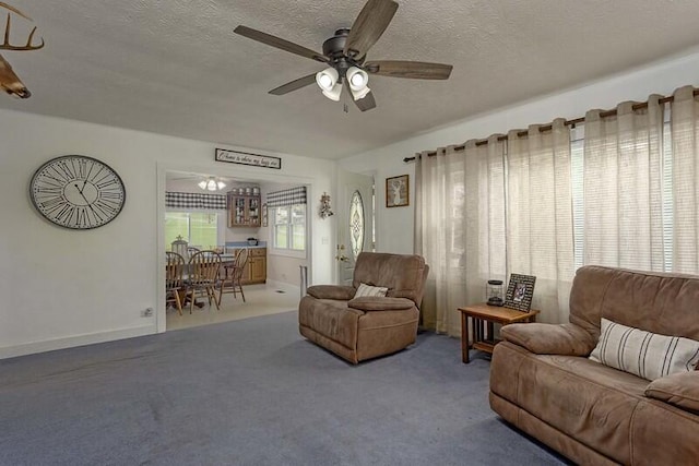 229 Plerce Hill St, Spring City, TN 37381 - living room featuring a ceiling fan, a textured ceiling, and carpet flooring