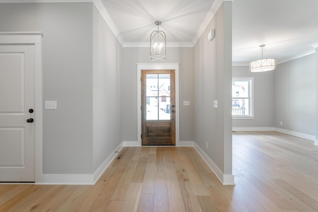 5118 Judd Way NW Unit 21, Cleveland, TN 37312 - entryway featuring light wood-style flooring, ornamental molding, a chandelier, and baseboards