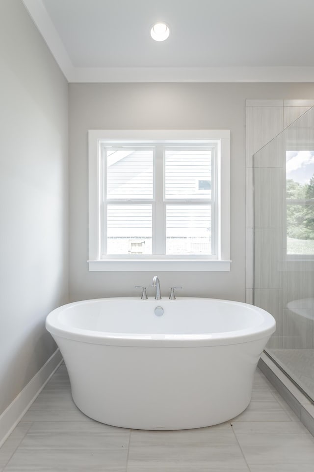 5118 Judd Way NW Unit 21, Cleveland, TN 37312 - full bathroom with a freestanding bath, baseboards, and a tile shower