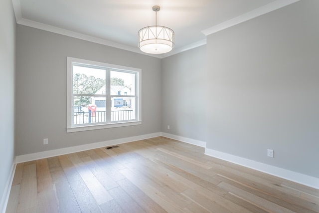 5118 Judd Way NW Unit 21, Cleveland, TN 37312 - spare room with ornamental molding, baseboards, and light wood-type flooring