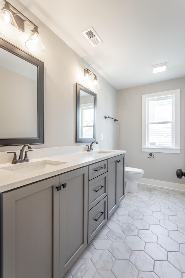 5118 Judd Way NW Unit 21, Cleveland, TN 37312 - bathroom featuring double vanity, plenty of natural light, and toilet
