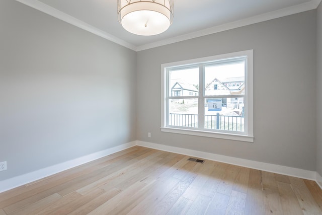 5118 Judd Way NW Unit 21, Cleveland, TN 37312 - spare room with ornamental molding, light wood-style floors, and baseboards