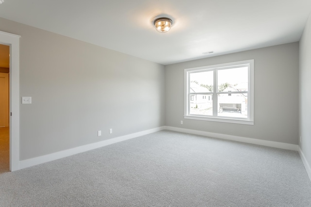 5118 Judd Way NW Unit 21, Cleveland, TN 37312 - spare room featuring light carpet and baseboards