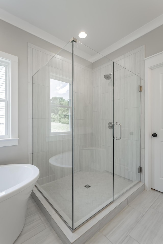 5118 Judd Way NW Unit 21, Cleveland, TN 37312 - full bathroom with a shower stall, a freestanding tub, and tile patterned flooring