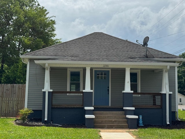 1220 Hardwick St SE, Cleveland, TN 37311 - bungalow with a shingled roof, fence, and a porch
