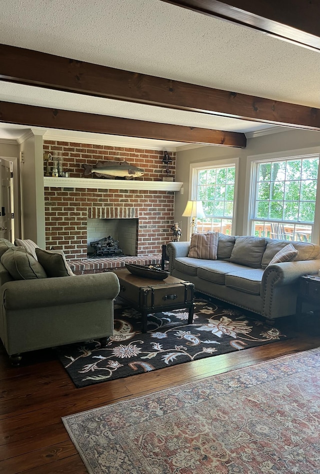 14318 Bluffview Dr, Birchwood, TN 37308 - living room with hardwood / wood-style flooring, beam ceiling, a brick fireplace, and a textured ceiling
