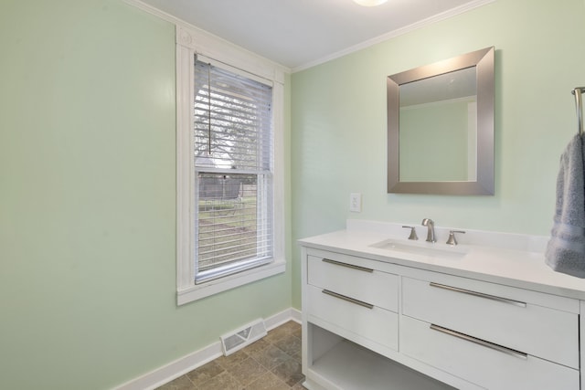 bathroom with vanity and crown molding