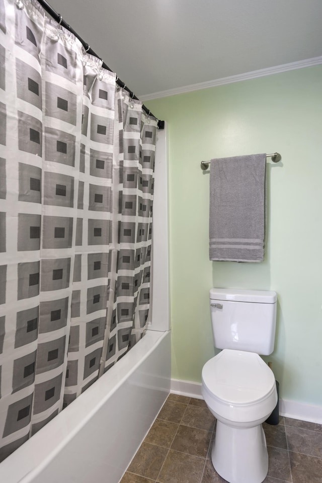 bathroom with tile patterned floors, toilet, shower / bath combo with shower curtain, and crown molding