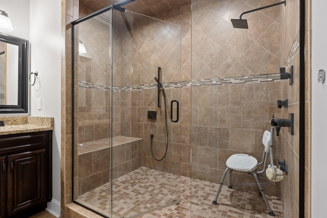 bathroom with vanity and an enclosed shower