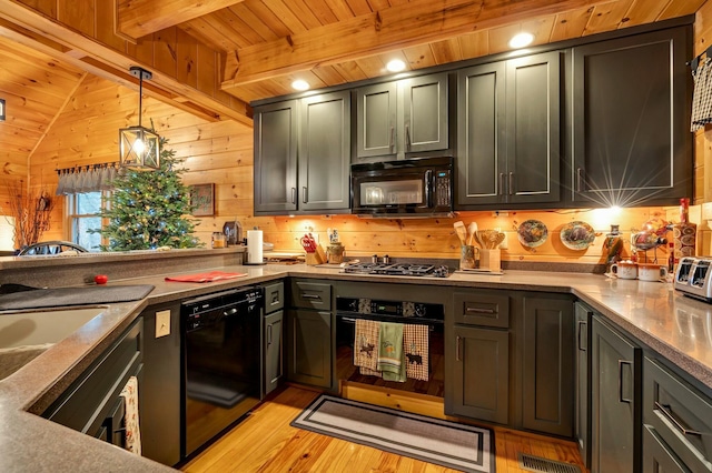 kitchen featuring wood ceiling, black appliances, beam ceiling, pendant lighting, and light hardwood / wood-style floors