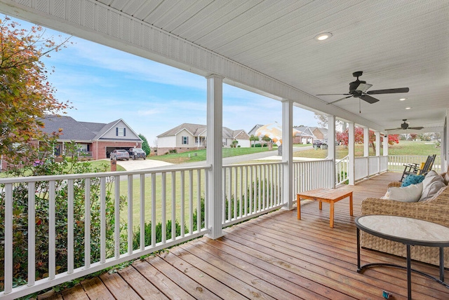 deck featuring ceiling fan and covered porch