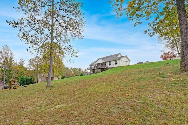 view of yard featuring a wooden deck