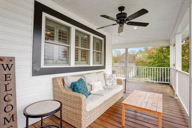 wooden terrace with covered porch and ceiling fan