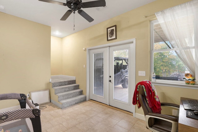 doorway to outside with french doors, a wealth of natural light, and ceiling fan