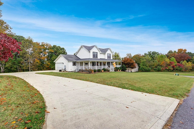 view of front facade featuring a front lawn, covered porch, and a garage