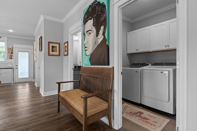 5086 Oop Rd, Chattanooga, TN 37416 - washroom featuring washing machine and dryer, dark wood-style flooring, cabinet space, crown molding, and recessed lighting