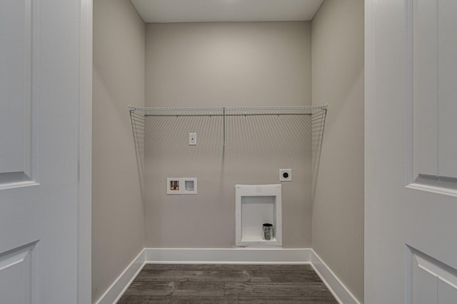 laundry area featuring hookup for a washing machine, dark hardwood / wood-style flooring, and electric dryer hookup