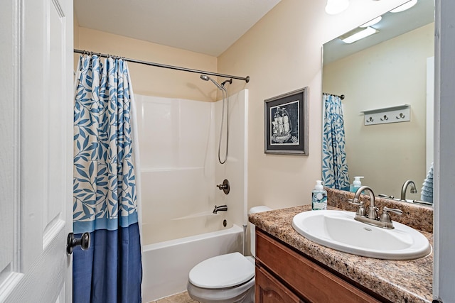 full bathroom featuring toilet, vanity, and shower / tub combo