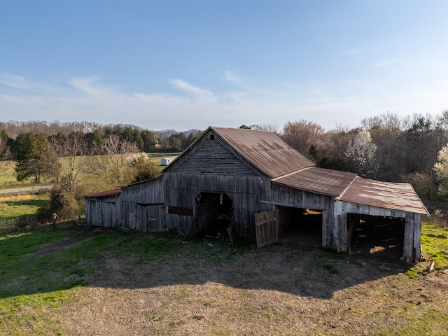 view of outdoor structure featuring a rural view