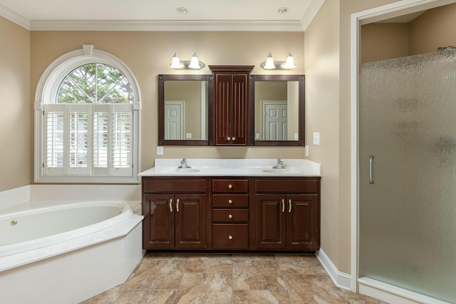 bathroom featuring separate shower and tub, vanity, and ornamental molding