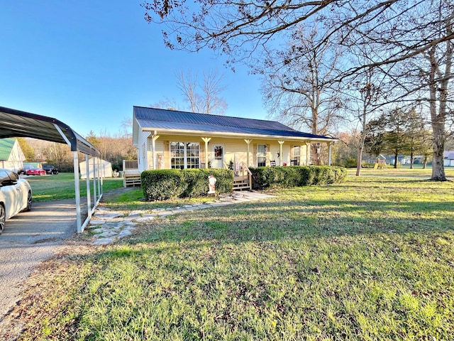 view of front facade with a carport, a porch, and a front lawn