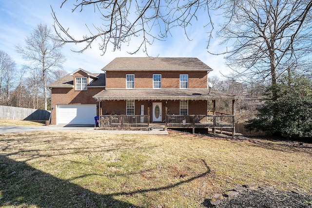 country-style home with a garage, covered porch, and a front lawn