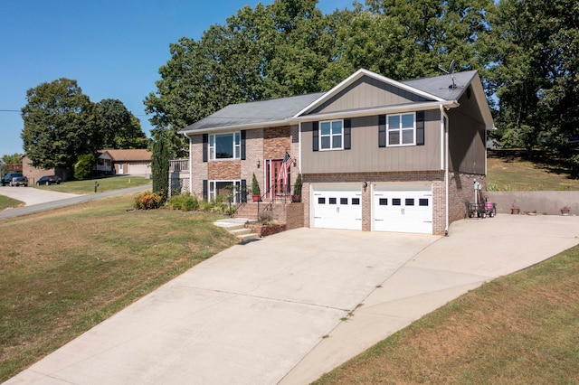 bi-level home with a front lawn and a garage