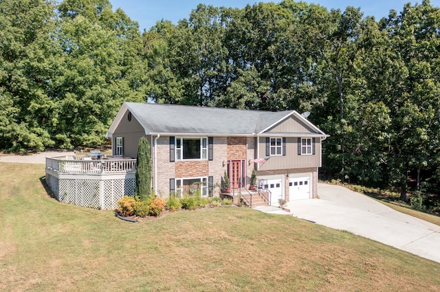 bi-level home featuring a garage, a front lawn, and a wooden deck