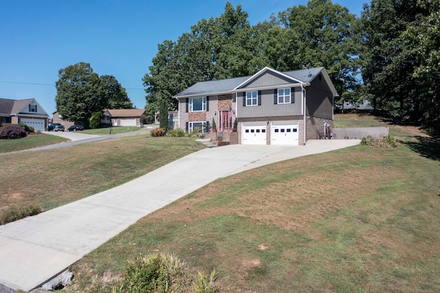 bi-level home featuring a front yard and a garage