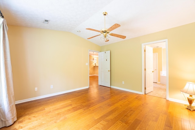 7826 Stone Garden Way, Powell, TN 37849 - unfurnished bedroom with light wood-style flooring, lofted ceiling, baseboards, and ceiling fan
