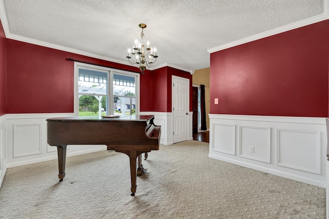 271 Hidden Oaks Trl NE, Cleveland, TN 37312 - sitting room with a wainscoted wall, a chandelier, a textured ceiling, carpet flooring, and ornamental molding