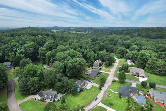 271 Hidden Oaks Trl NE, Cleveland, TN 37312 - aerial view of property and surrounding area featuring a forest