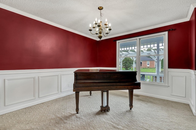 271 Hidden Oaks Trl NE, Cleveland, TN 37312 - sitting room featuring a chandelier, a textured ceiling, light colored carpet, a wainscoted wall, and ornamental molding