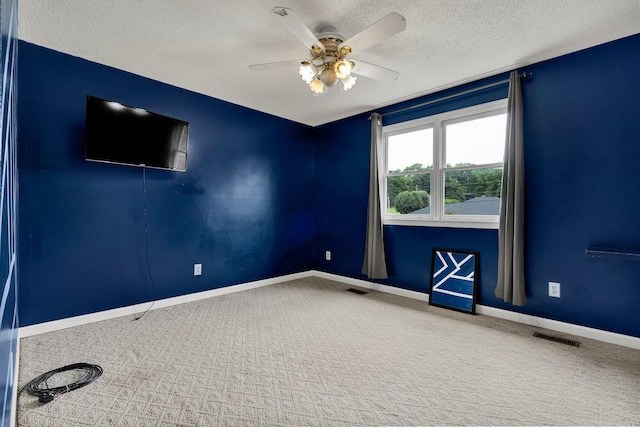 271 Hidden Oaks Trl NE, Cleveland, TN 37312 - carpeted empty room with a textured ceiling and a ceiling fan