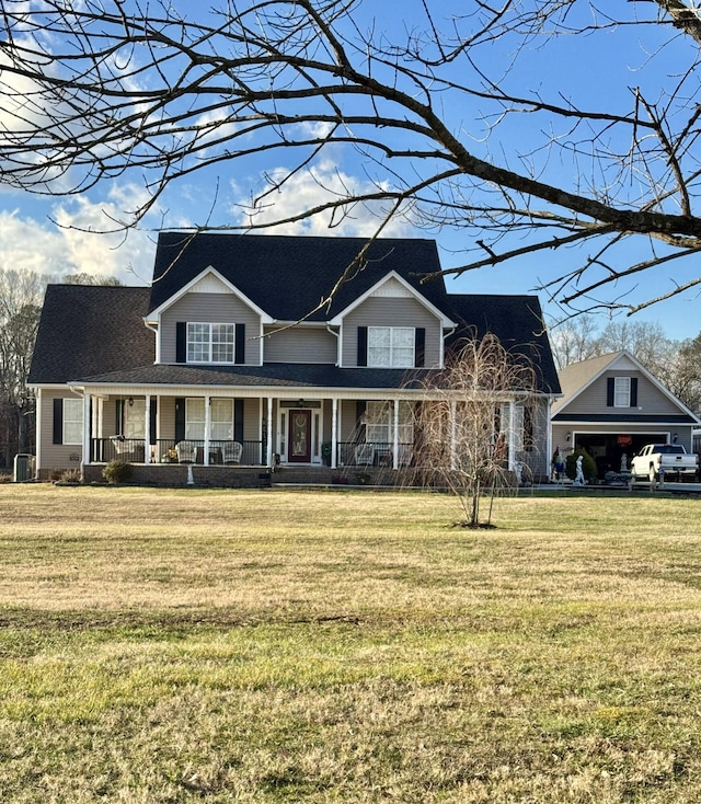 view of front of property featuring a front yard, central air condition unit, and a porch