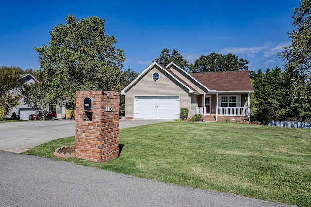 view of front of property featuring a garage, covered porch, and a front yard