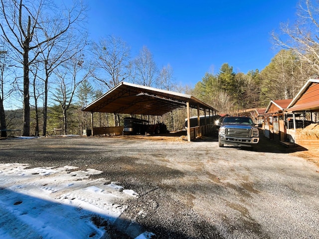 view of parking with a carport