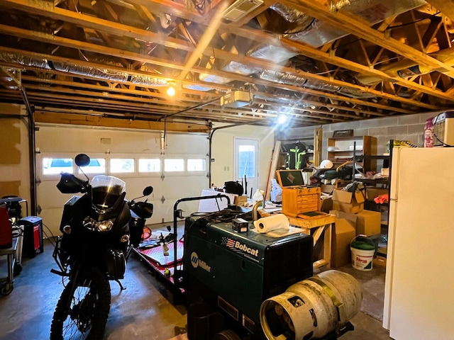 garage with white fridge