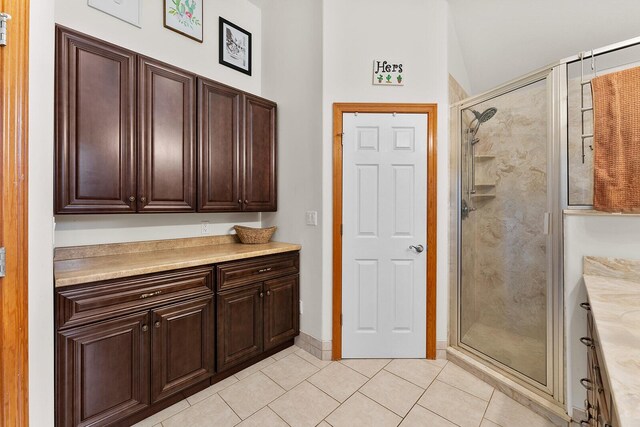 407 Kahite Trl, Vonore, TN 37885 - bathroom with tile patterned flooring and a stall shower