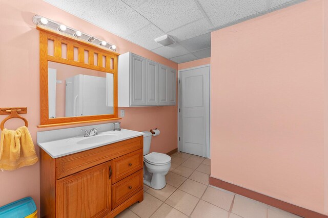 407 Kahite Trl, Vonore, TN 37885 - bathroom with toilet, vanity, tile patterned floors, and a drop ceiling