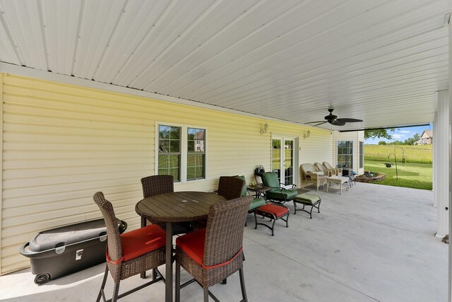407 Kahite Trl, Vonore, TN 37885 - view of patio / terrace with french doors, outdoor dining space, and a ceiling fan