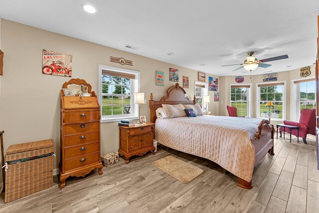 407 Kahite Trl, Vonore, TN 37885 - bedroom with light wood-type flooring, ceiling fan, and recessed lighting