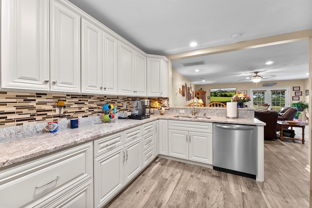 407 Kahite Trl, Vonore, TN 37885 - kitchen with stainless steel dishwasher, a sink, light wood-type flooring, a ceiling fan, and recessed lighting