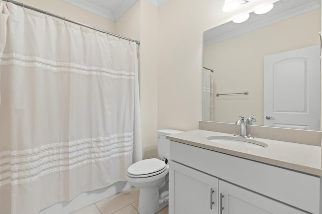 bathroom with tile patterned floors, ornamental molding, toilet, and vanity